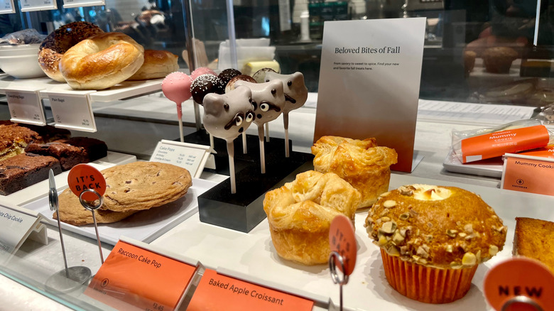 The display window at a Starbucks filled with fall pastries and desserts