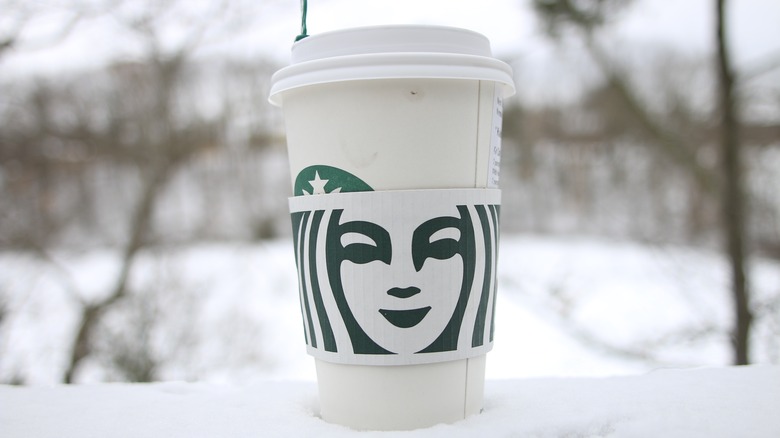 Starbucks cup with snowy background