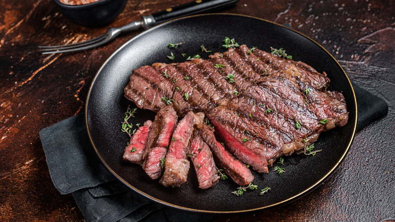 Steak on a plate with herbs