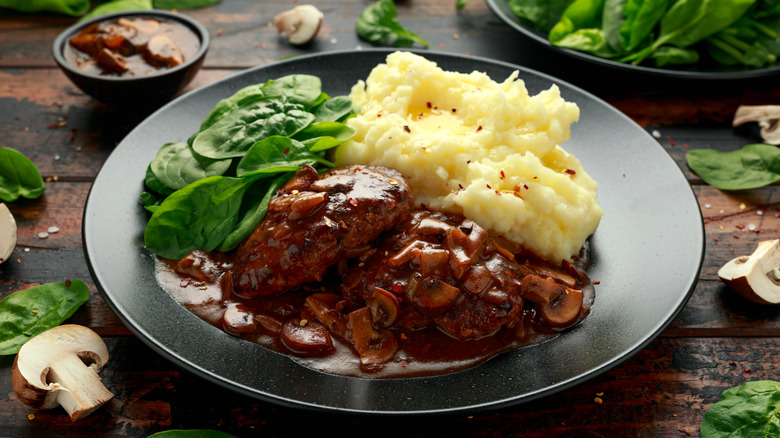 Salisbury steak with mashed potatoes and spinach
