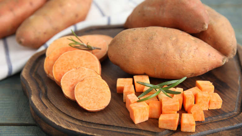 Slices and cubes of raw sweet potatoes 