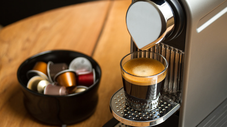 photo of Nespresso coffee machine and cups