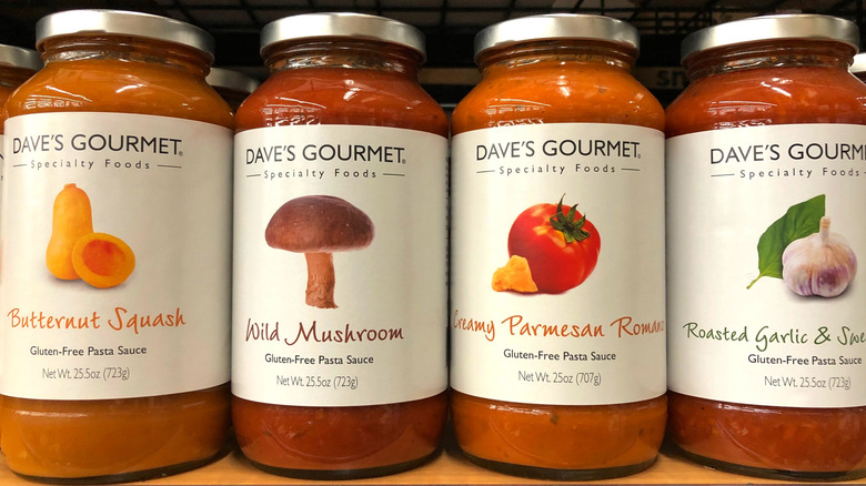 Four cans of Dave's Gourmet pasta sauce, including the Wild Mushroom.