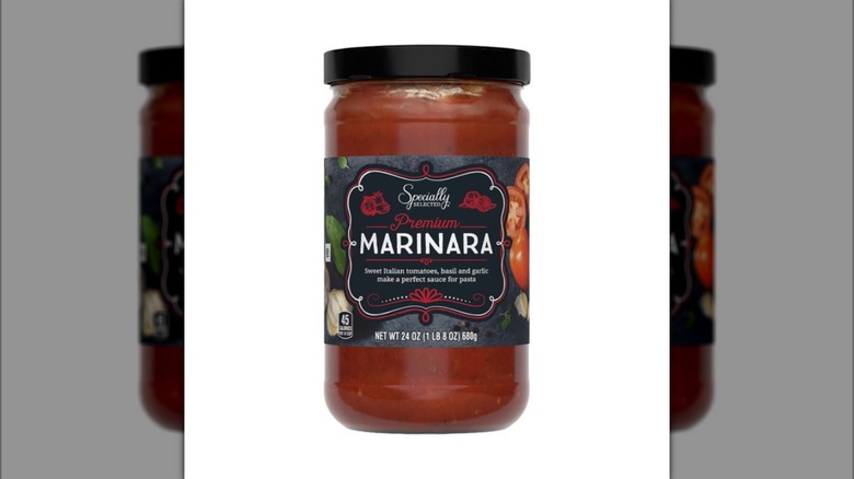 Jar of Aldi store brand  Specially Selected Marinara Pasta Sauce on white background