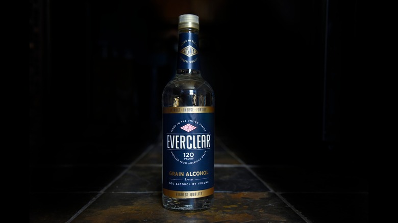 Everclear bottle against dark background.
