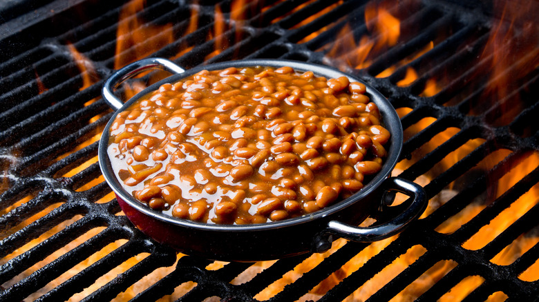 baked bean dish on grill