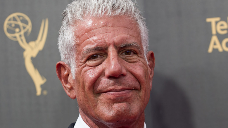 Anthony Bourdain smiling at event