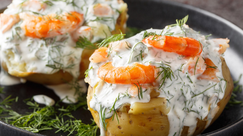 shrimp and cream sauce on baked potatoes