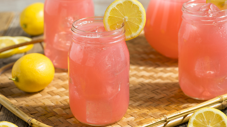 pink lemonade in glass jars