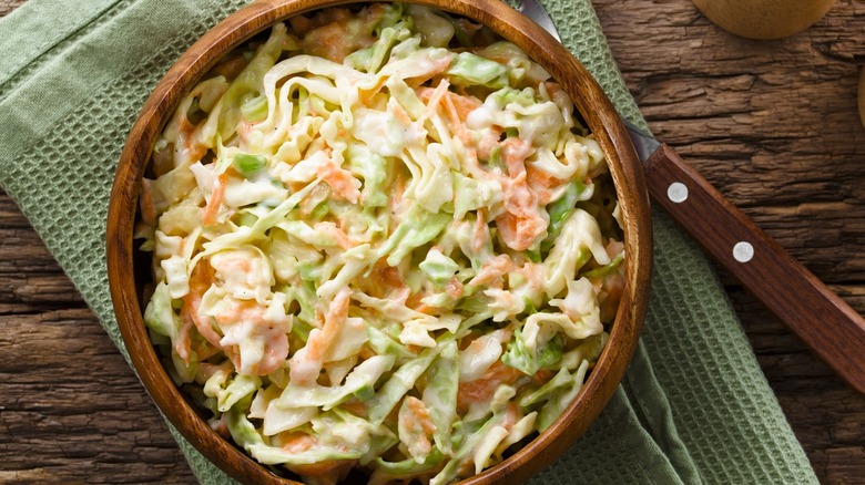 cole slaw in a wood bowl