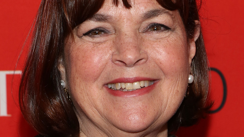 Ina Garten smiling on a red carpet