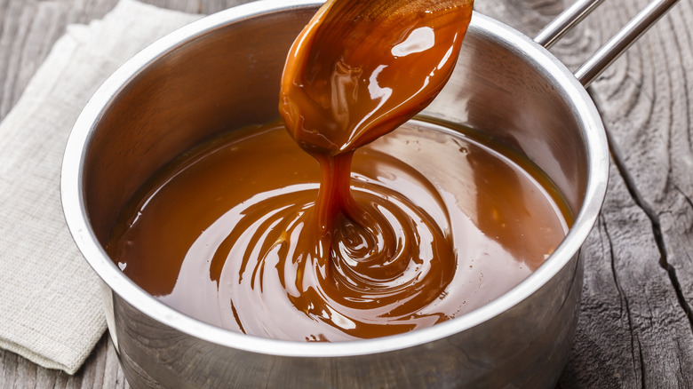 Gravy boat liquid caramel sauce