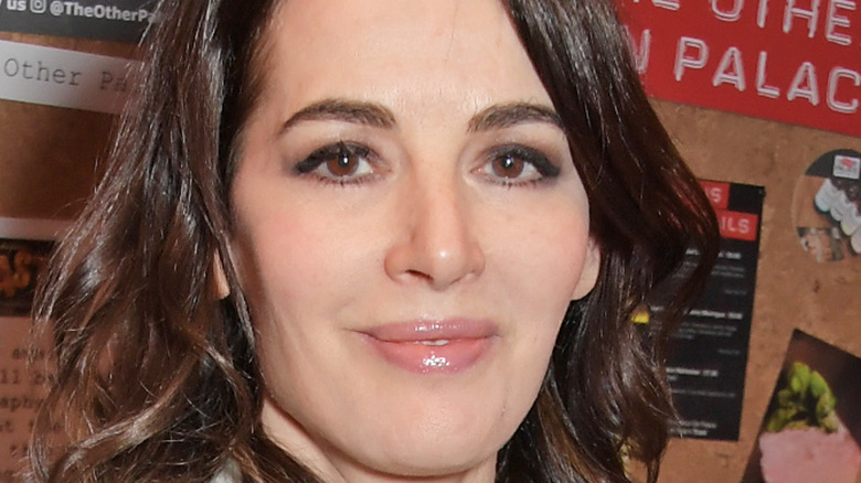 Nigella Lawson smiles with glossed lips
