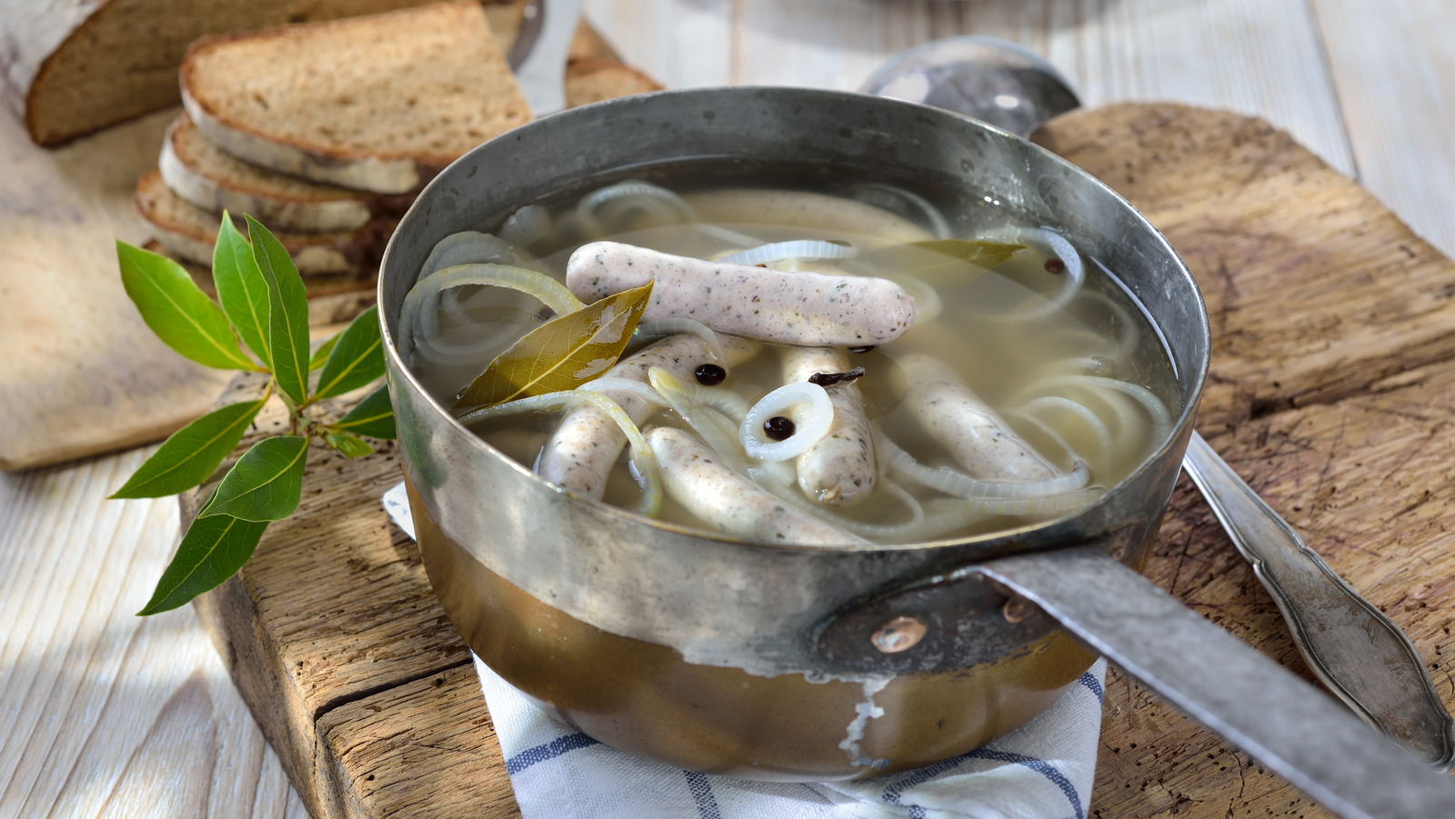 The Tasty Reason You Should Be Boiling Sausage