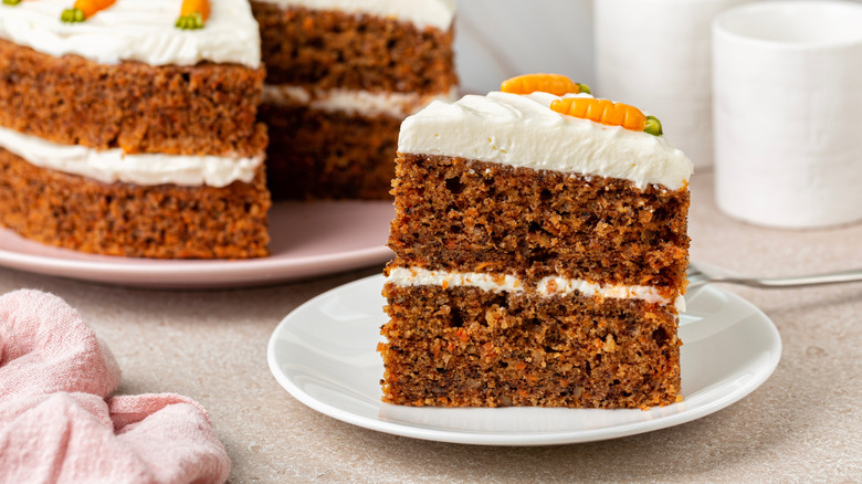 A slice of layered carrot cake