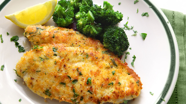 breaded chicken breast on a plate 