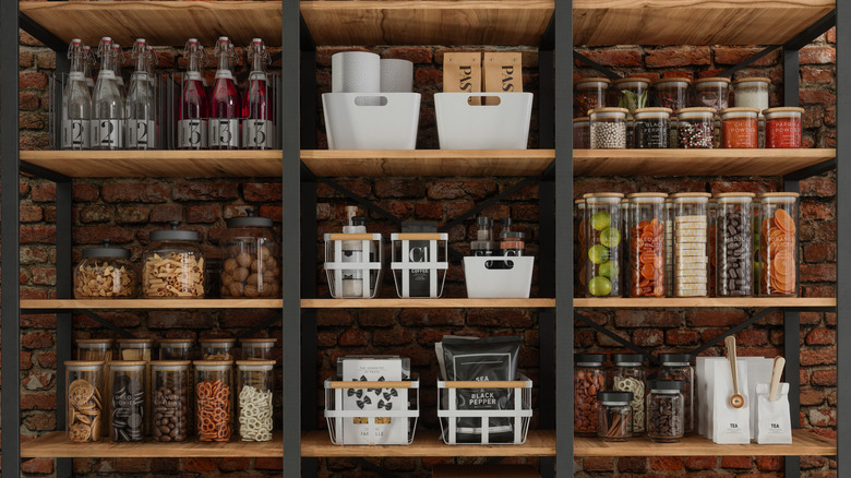 neatly organized pantry with bins