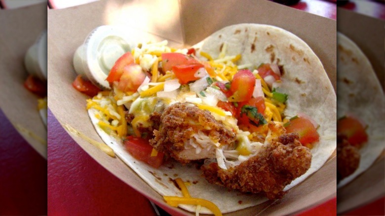 Torchy's taco with cheese and chicken