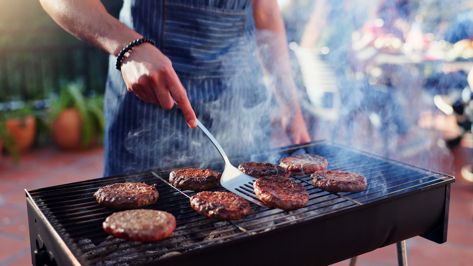 The Timing Rule A Grilling Expert Follows When Seasoning Burger Patties