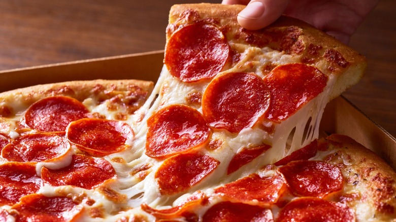 Pepperoni pizza with cheese pull