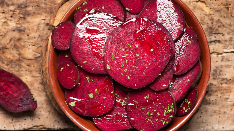 sliced beets in a rustic bowl