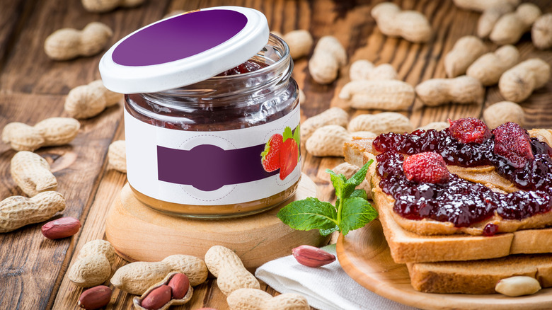 peanut butter and jelly sandwich with jar