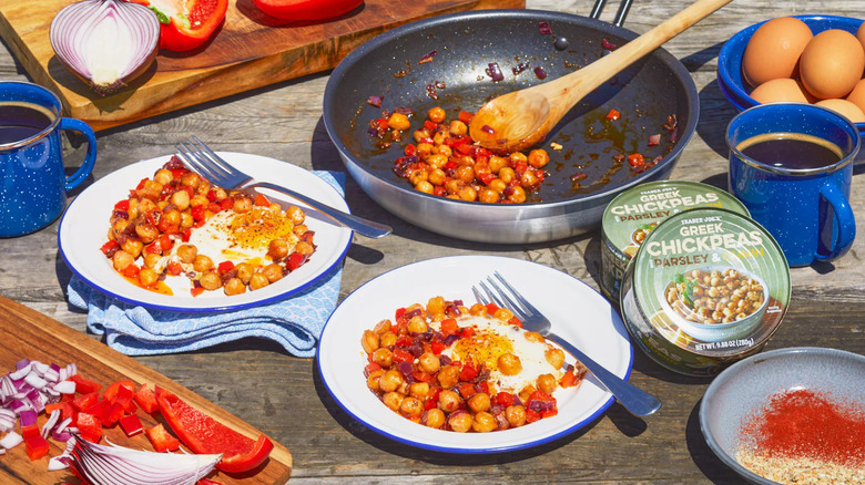 Plates, pans, and can of Greek Chickpeas with Cumin and Parsley