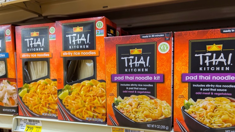 Boxes of Thai Kitchen pad Thai noodle kits on shelf