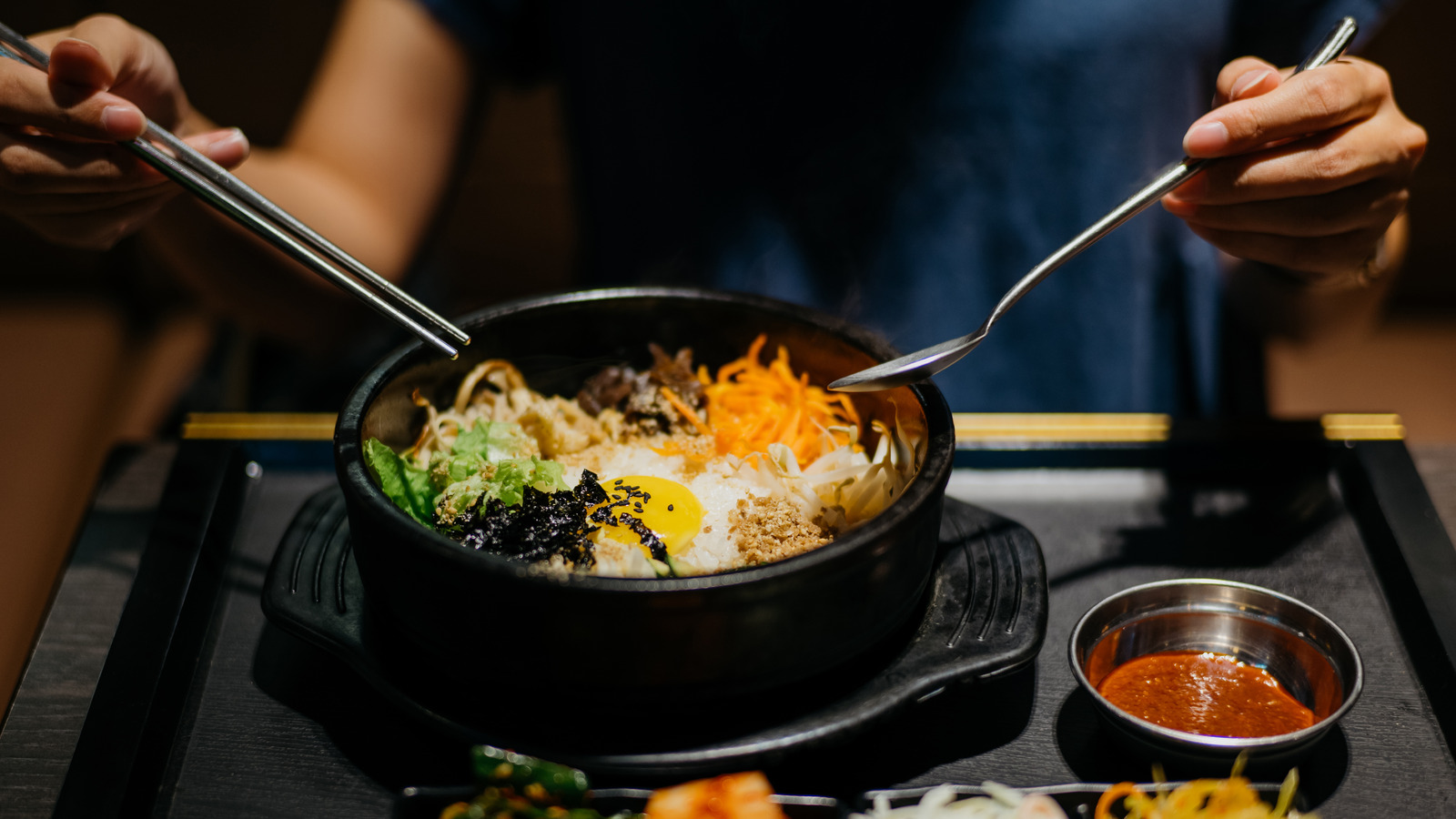 The Traditional Way To Eat Korean Bibimbap Bowls