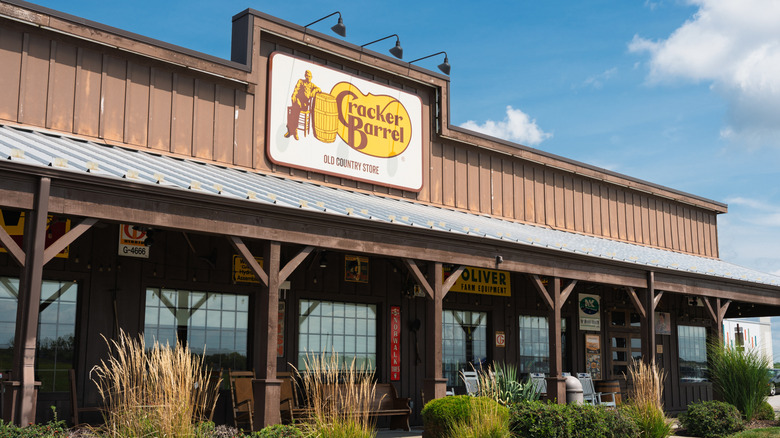 A Cracker Barrel storefront with saloon-style wooden architecture.