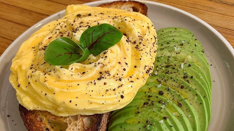 Folded eggs with toast and avocado