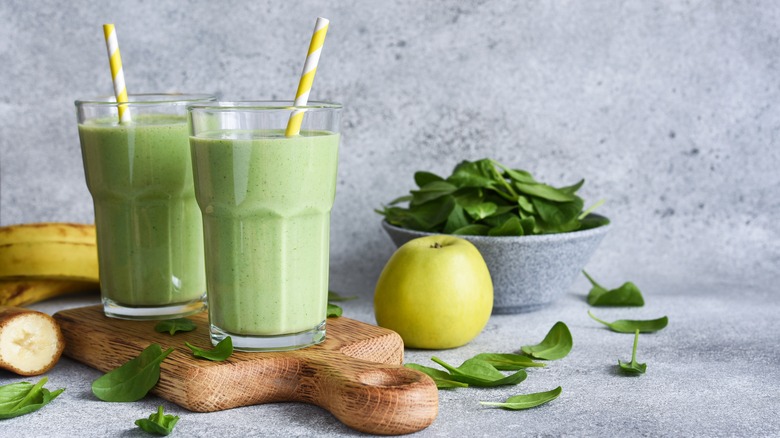 green smoothies on cutting board