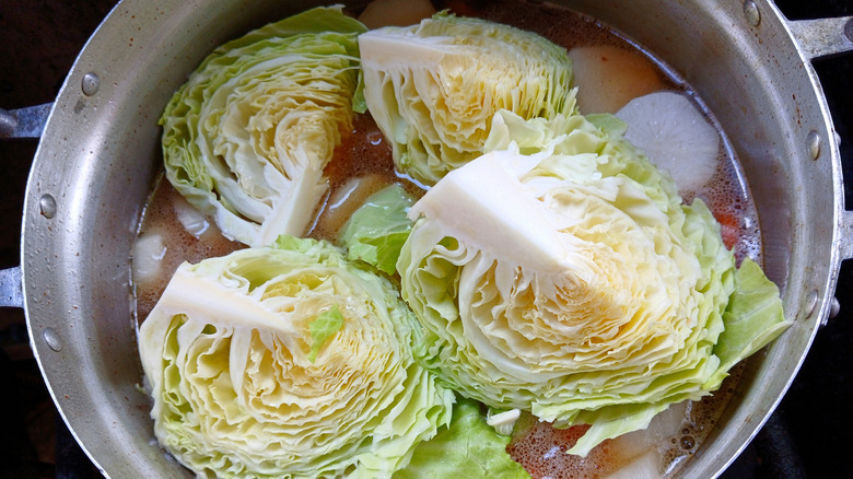 cabbage wedges in a boiling pot