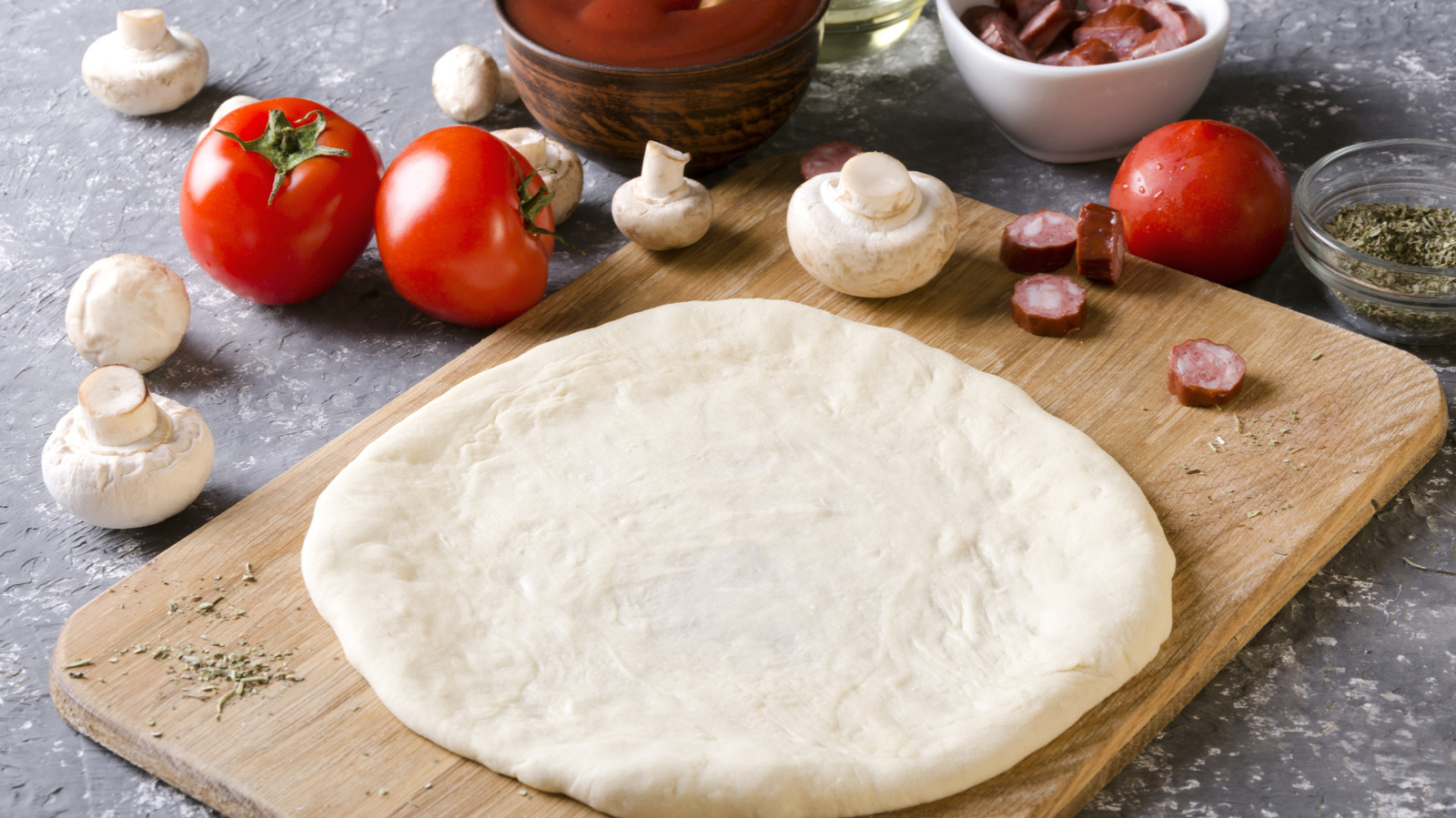 The Trick To Making Pizza Dough That Gives You Sourdough Flavor Without The Wait