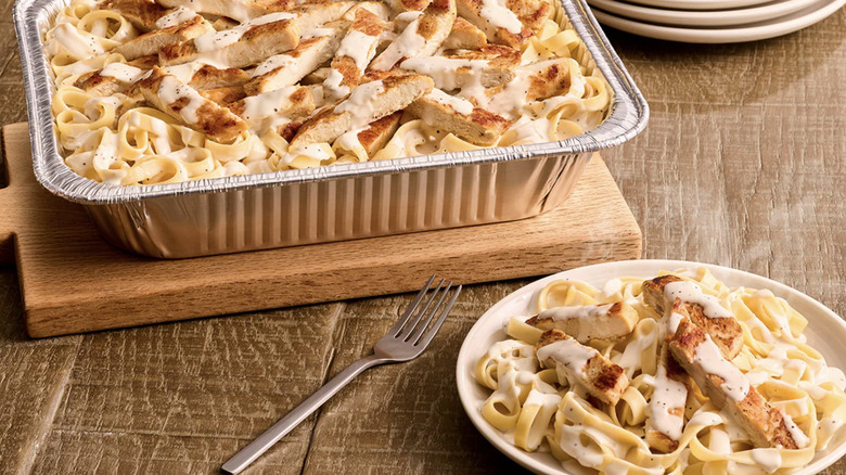 Olive Garden's Chicken Alfredo in troy with fork