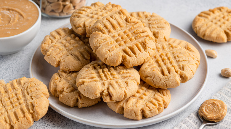 peanut butter cookies stacked on plate