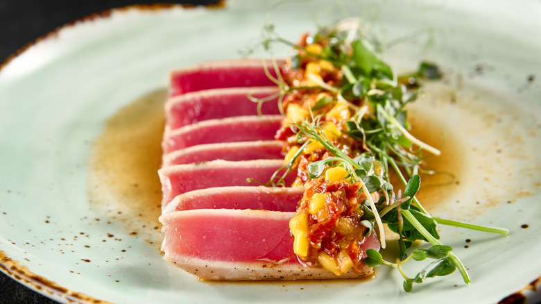 plate of tuna steaks with mango salsa