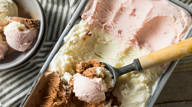 scooping neopolitan ice cream