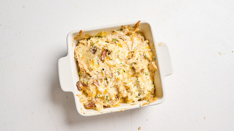 chicken bacon ranch dip in a casserole dish