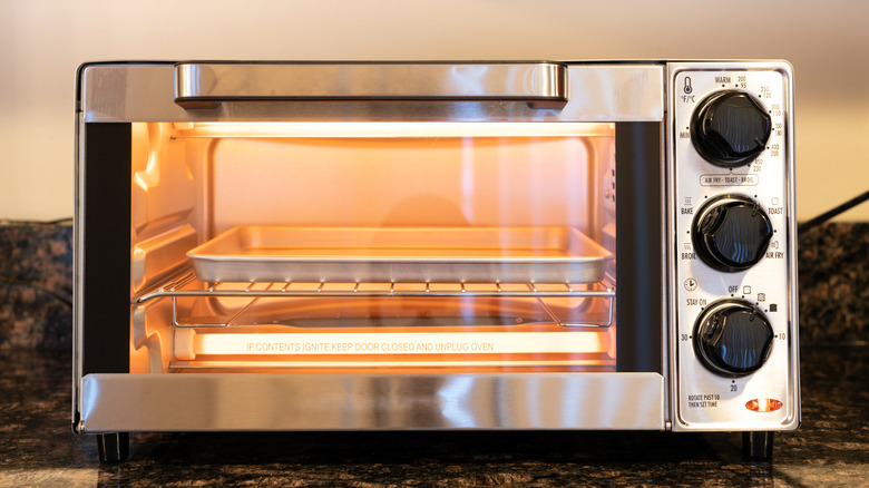 Shiny new toaster oven on kitchen counter