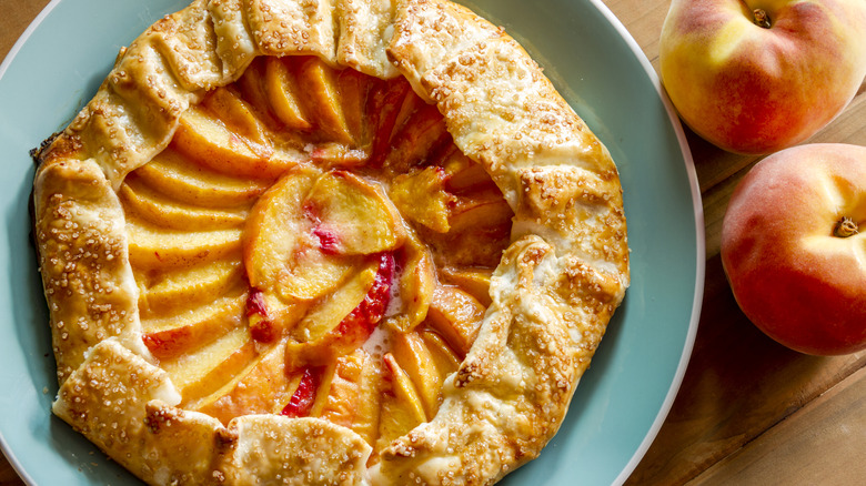Peach cobbler and fresh peaches