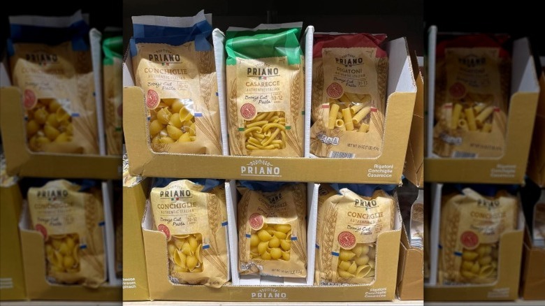 Bags of Aldi's bronze-cut pasta on a store shelf