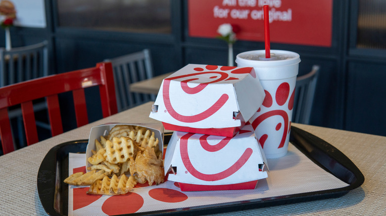 Chick-Fil-A meal with boxes and drink on a table