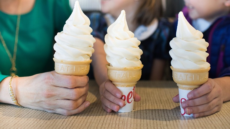 People holding up Icedream cones at Chick-fil-A