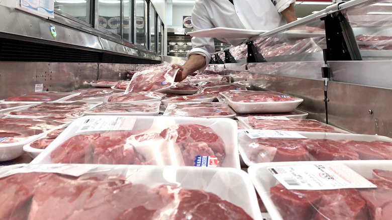 Various steaks in the fridge at Costco