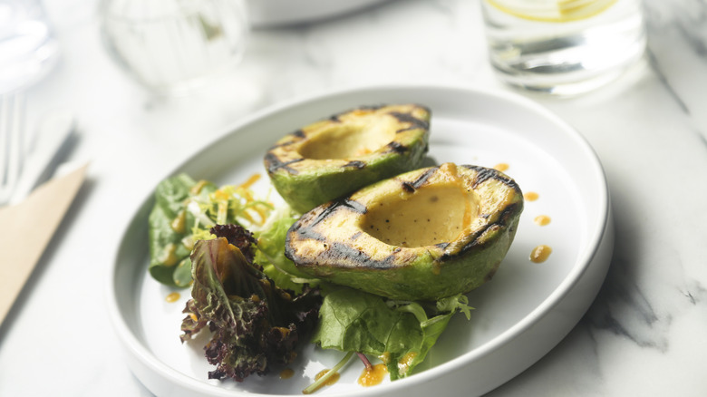 grilled avocado served with salad