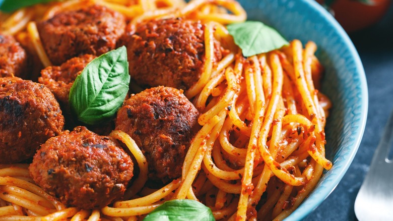 Meatballs and spaghetti with herbs
