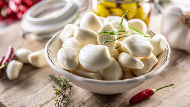 A bowl of peeled garlic cloves