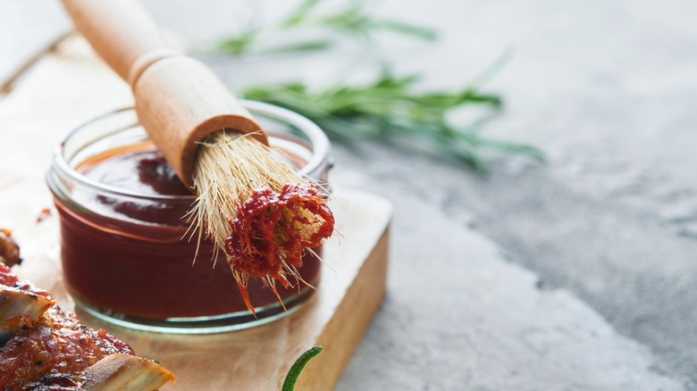 barbecue sauce with basting brush