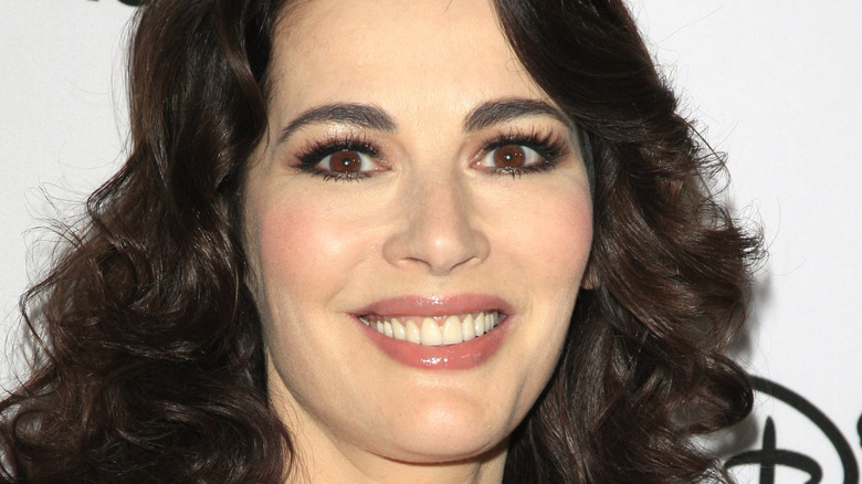 Nigella Lawson smiles with curly hair
